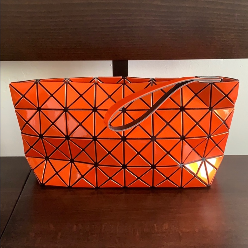 Issey Miyake BaoBao orange clutch